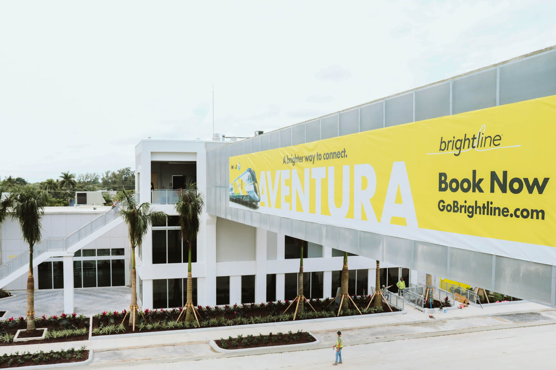 Brightline crossing the bridge